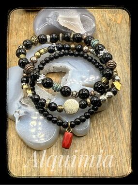 Curated black onyx bracelet stack + Ando Bruja